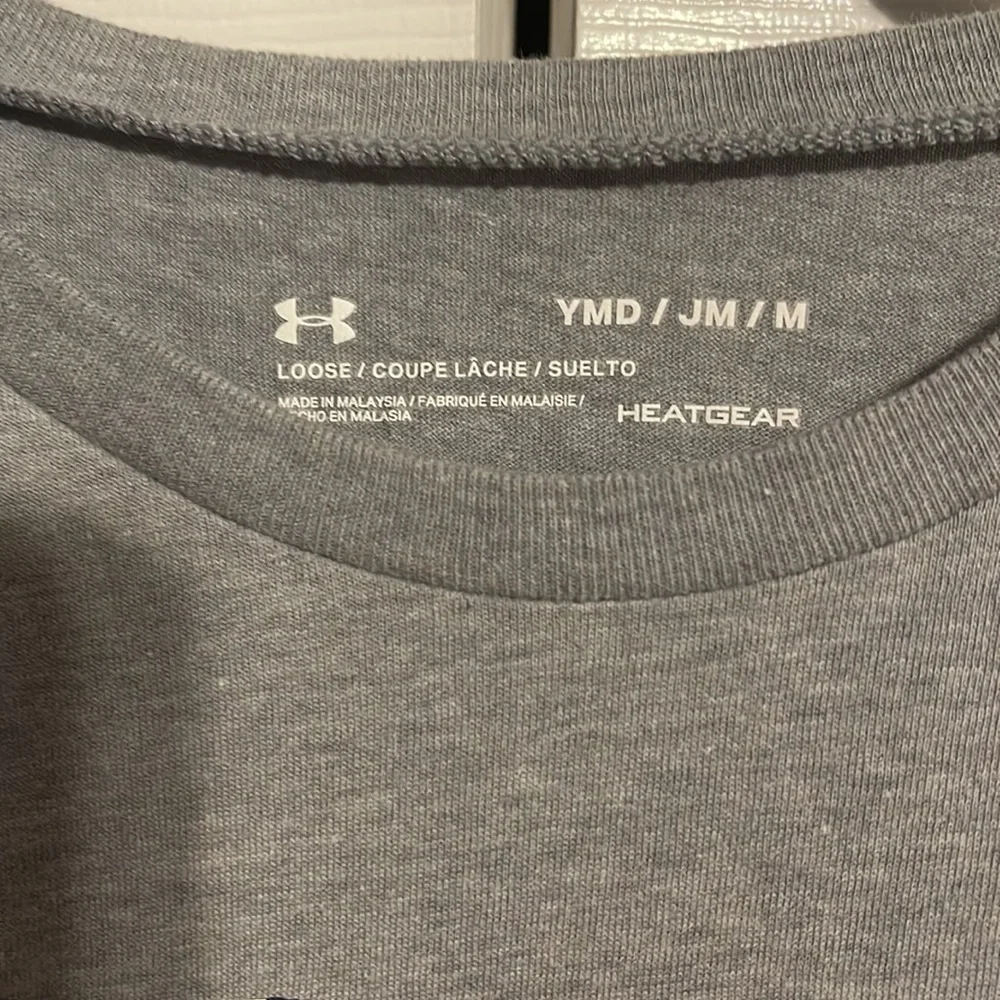 Under Armour protect this house short sleeve shirt in size youth medium NWOT